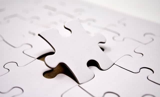 A puzzle piece and puzzle